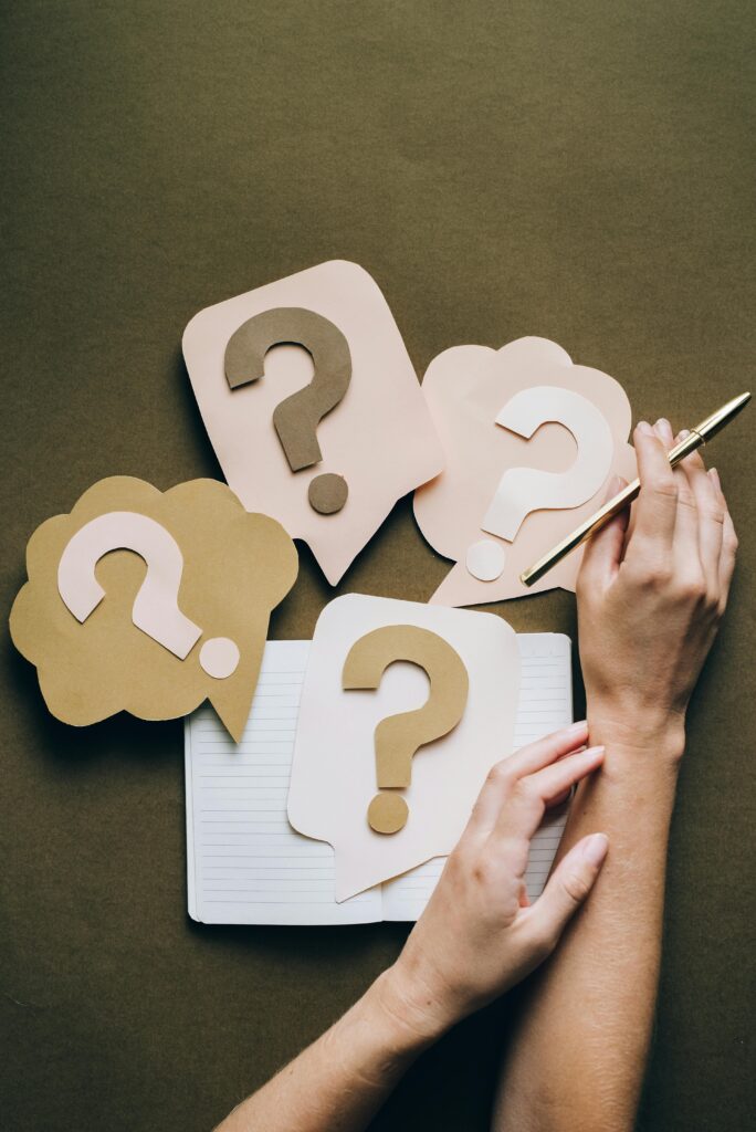 picture of question marked cut out of construction paper - showing doubt, delay, and indecision